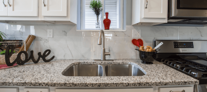 kitchen sink backing up into bathtub