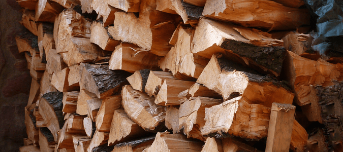 Stacks of firewood pressed against a home, something that will attract termites