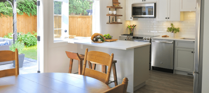 A kitchen with a dishwasher and sink