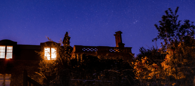 A house and garden at night