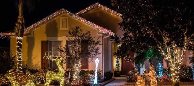 A home decorated with colorful Christmas lights
